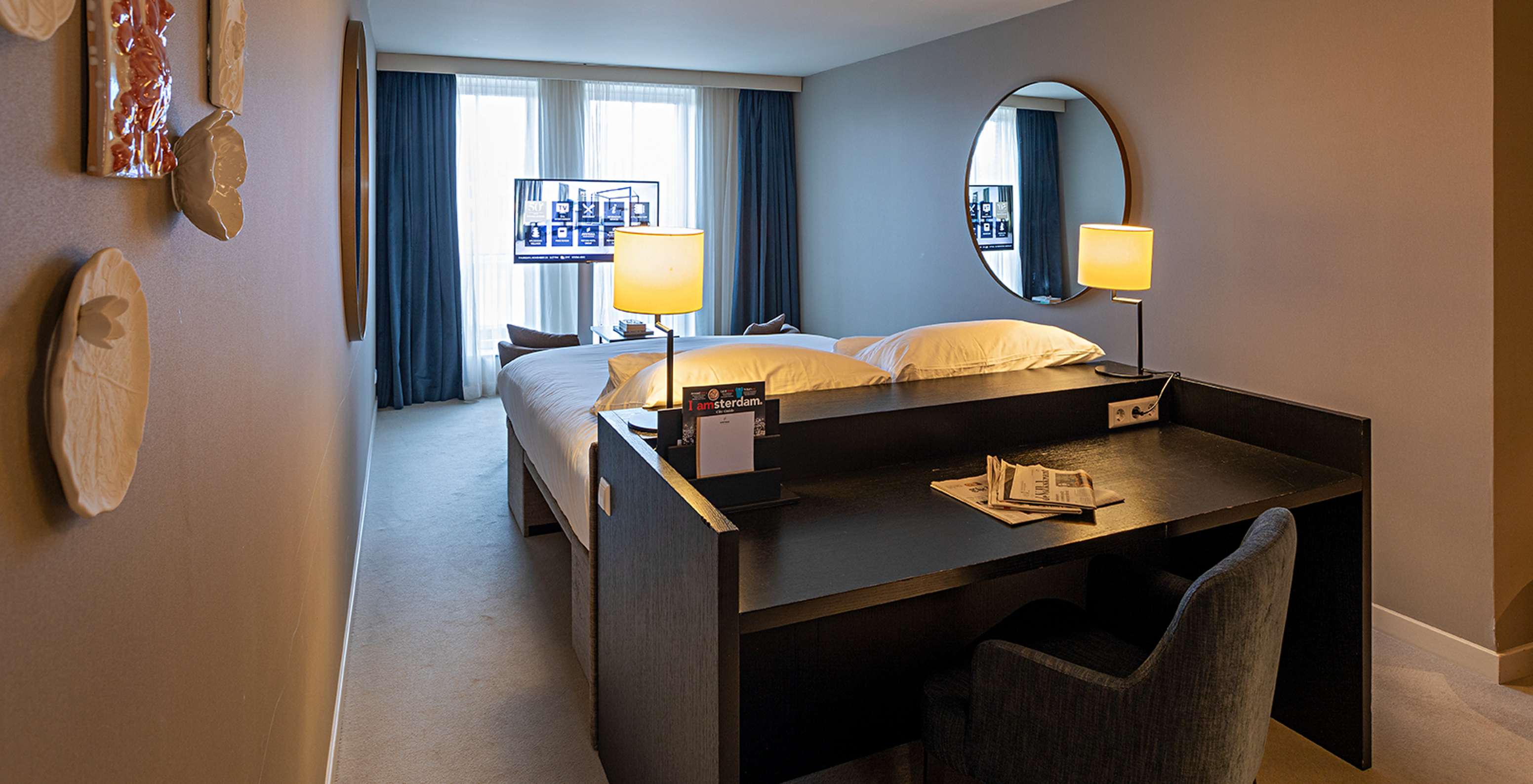 Das Superior - Flussblick Zimmer im Pestana Amsterdam Riverside hat einen Fernseher