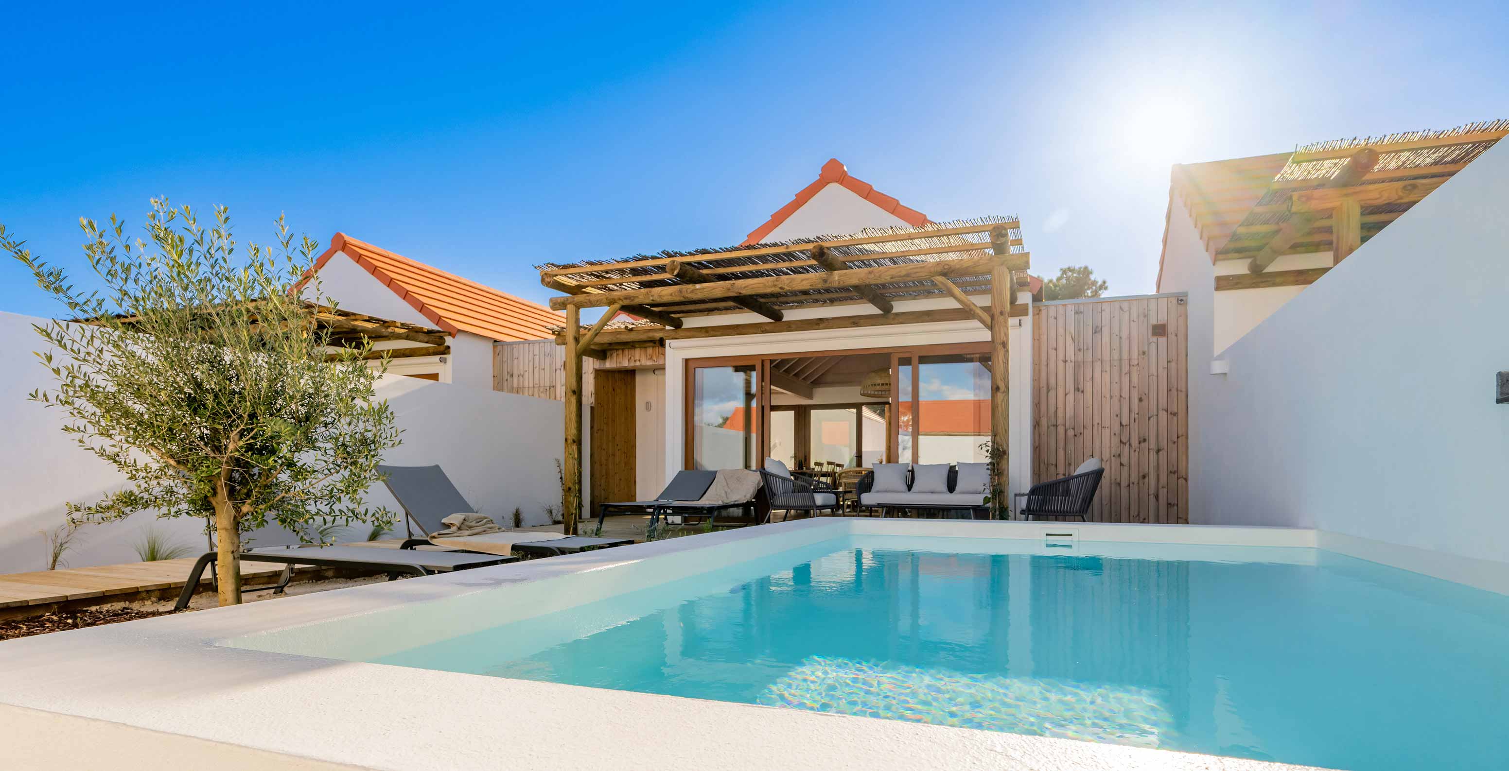The Superior Villa at Pestana Comporta Village Residences has an exterior with a pool and several sun loungers