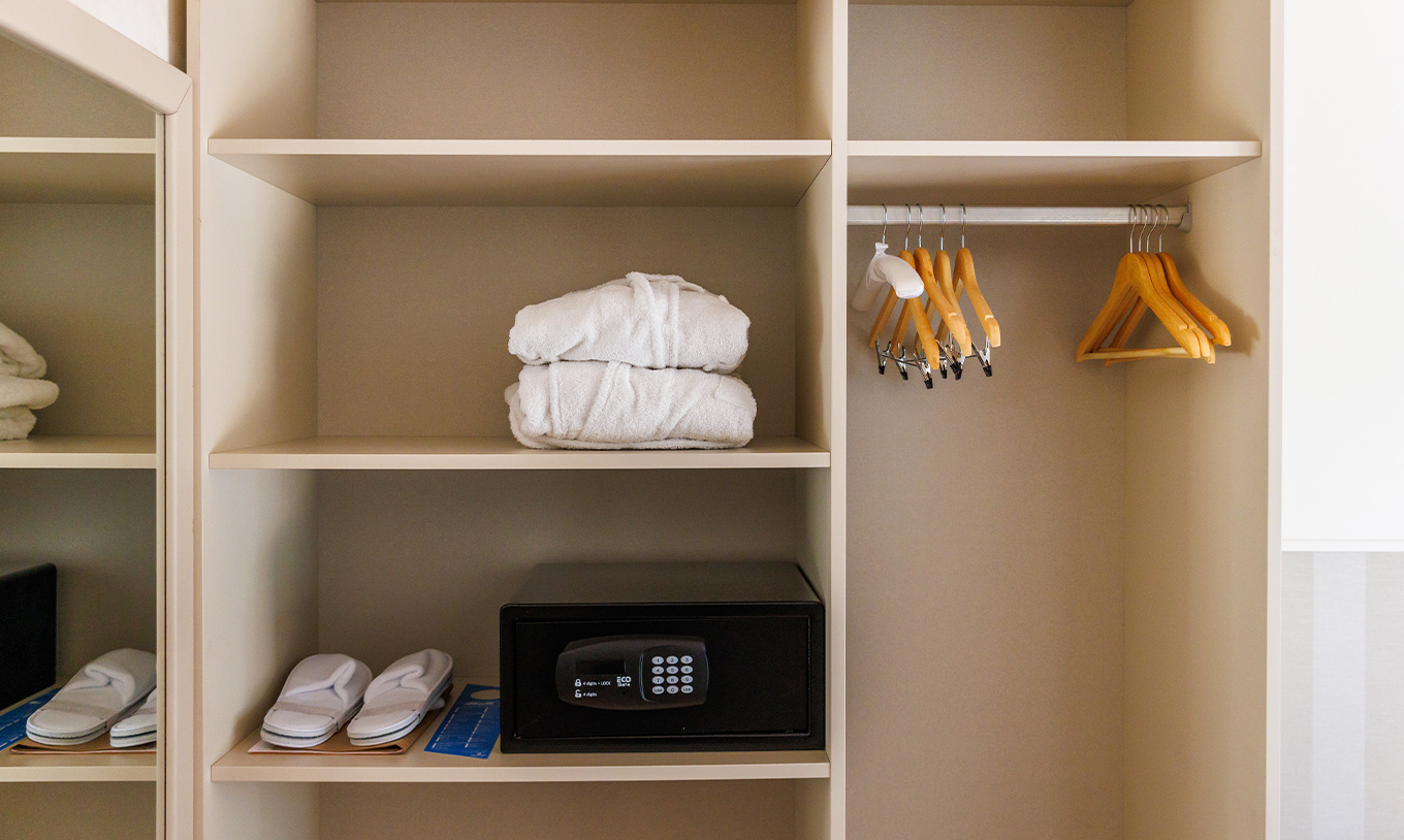 The Family Garden View at Pestana Vila Sol - Vilamoura has a wardrobe with safe, two robes and complimentary slippers