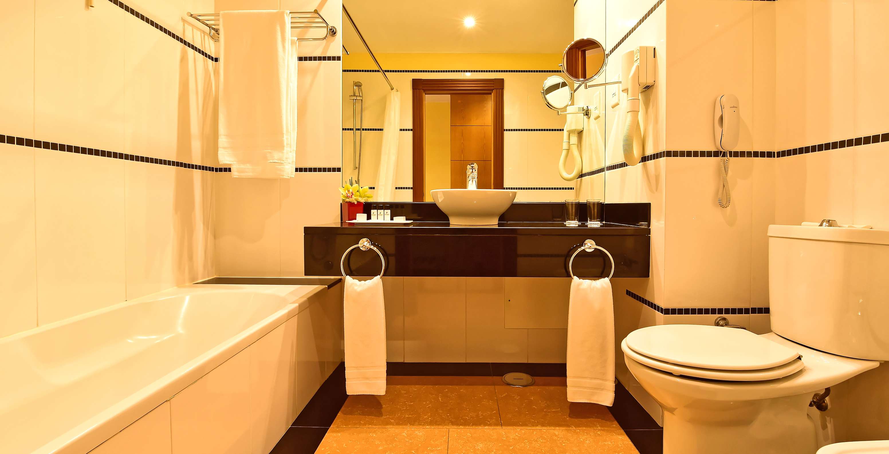 The Superior Double of Pestana Sintra Golf has a bathroom with bathtub, sink with mirror, amenities, and toilet