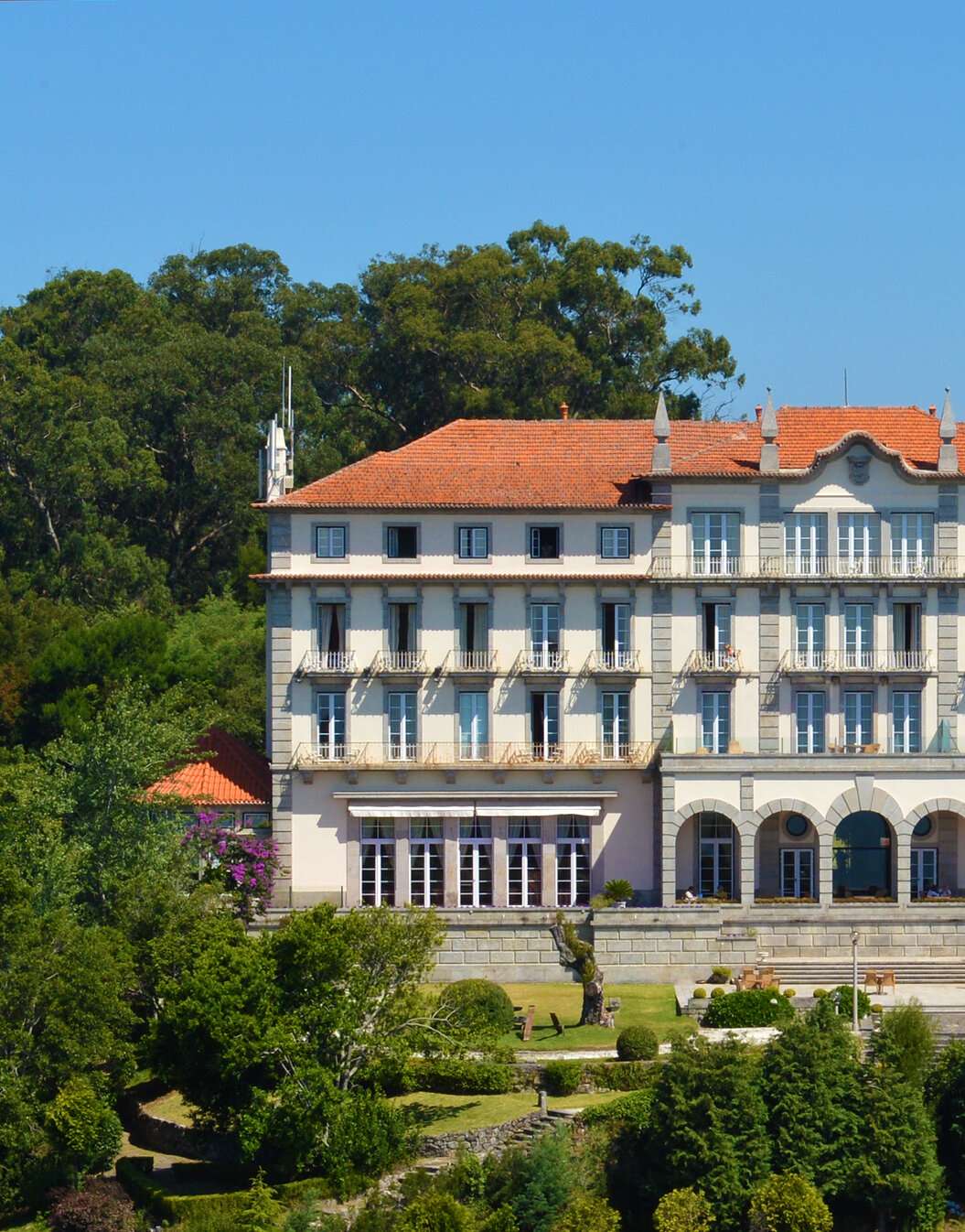 Exterior view of the building of Pousada Viana do Castelo, a historic building on Monte de Santa Luzia, filled with windows