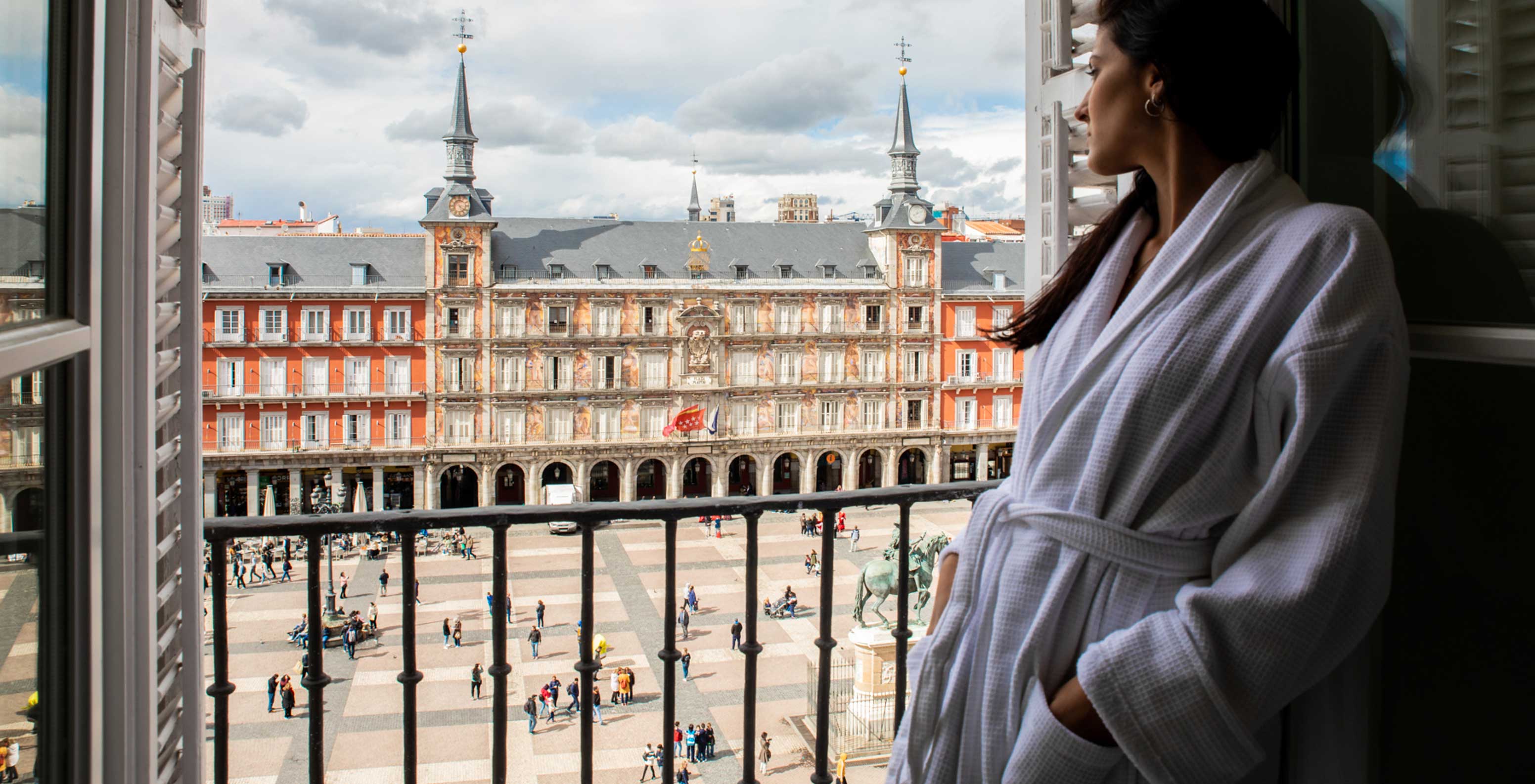 The Superior Plaza Mayor at Pestana Plaza Mayor Madrid has double bed, large window, balcony with Plaza Mayor view