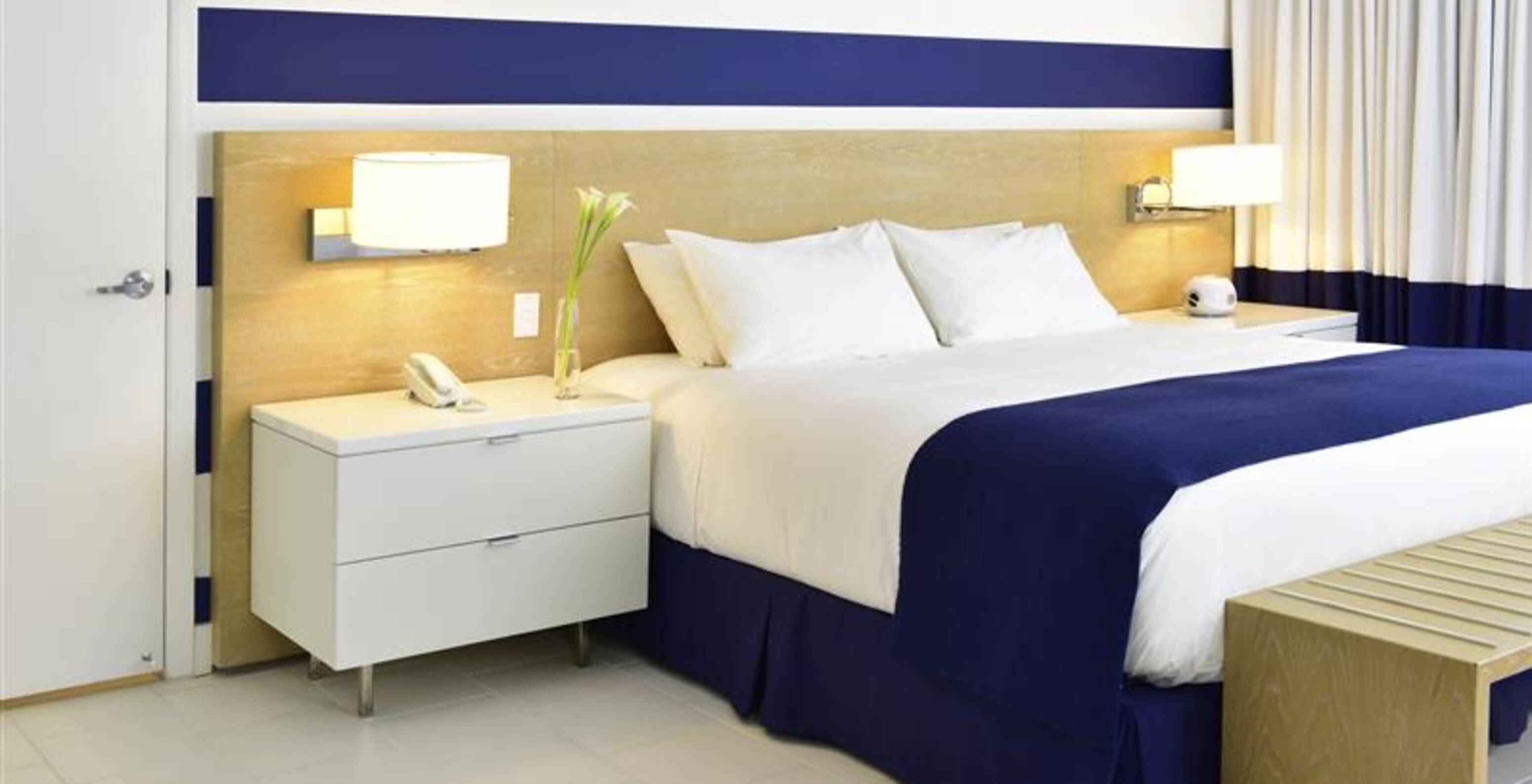 The Superior King - ADA at Pestana Miami South Beach has a double bed and bedside table