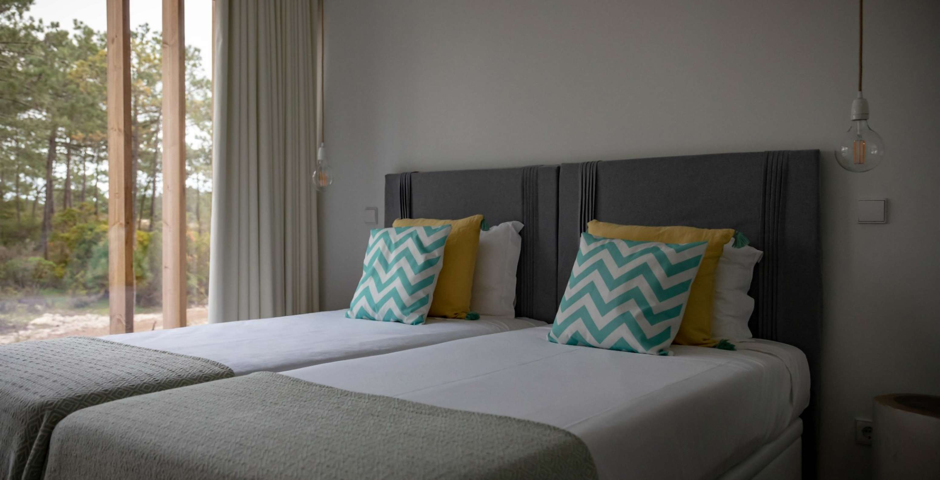 The Eco Village Apartment Ground Floor Views of Pestana Tróia Eco Resort has two beds combined and two lamps