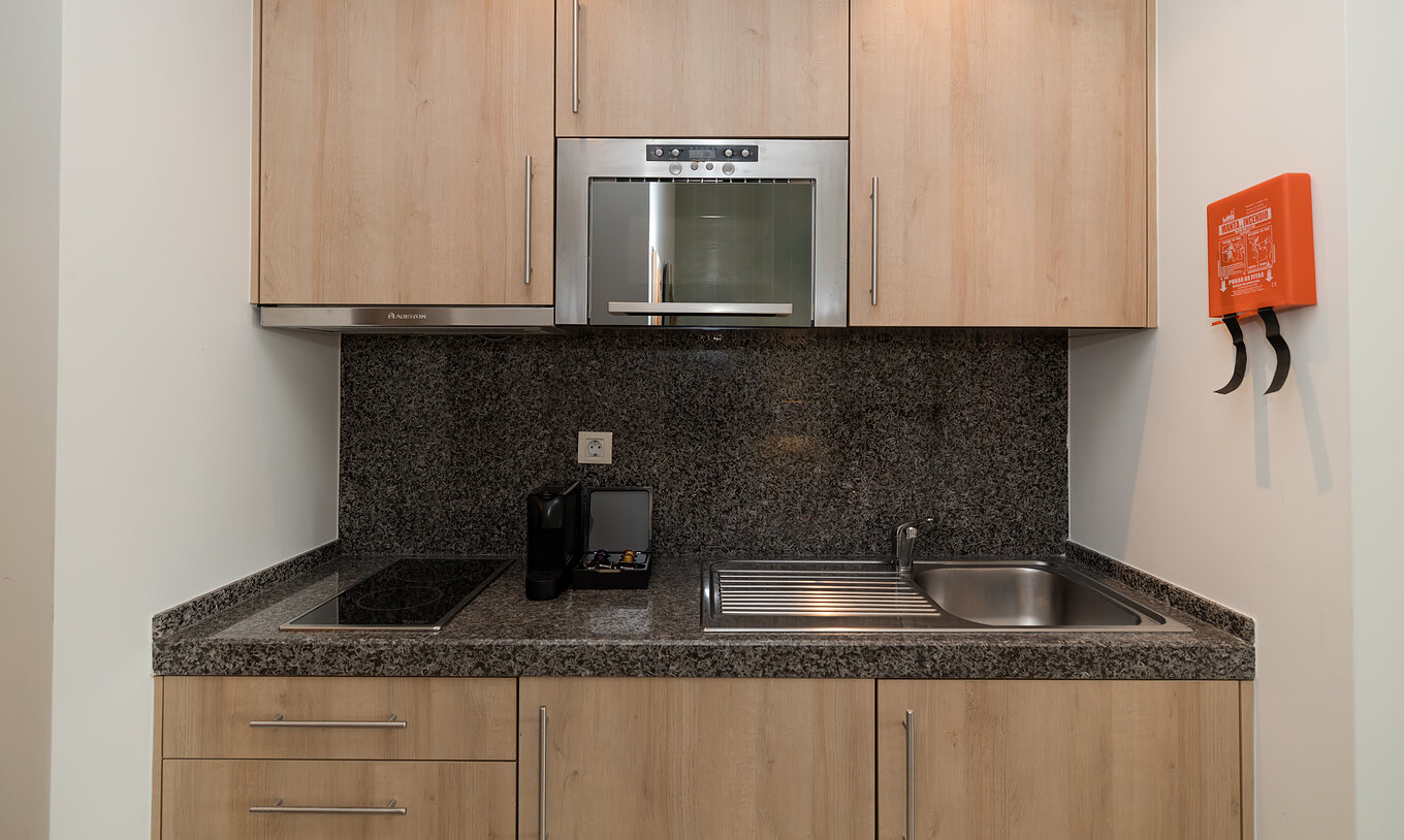 Studio Sea View at Pestana Alvor Beach Villas has a kitchenette with stove, sink and coffee machine