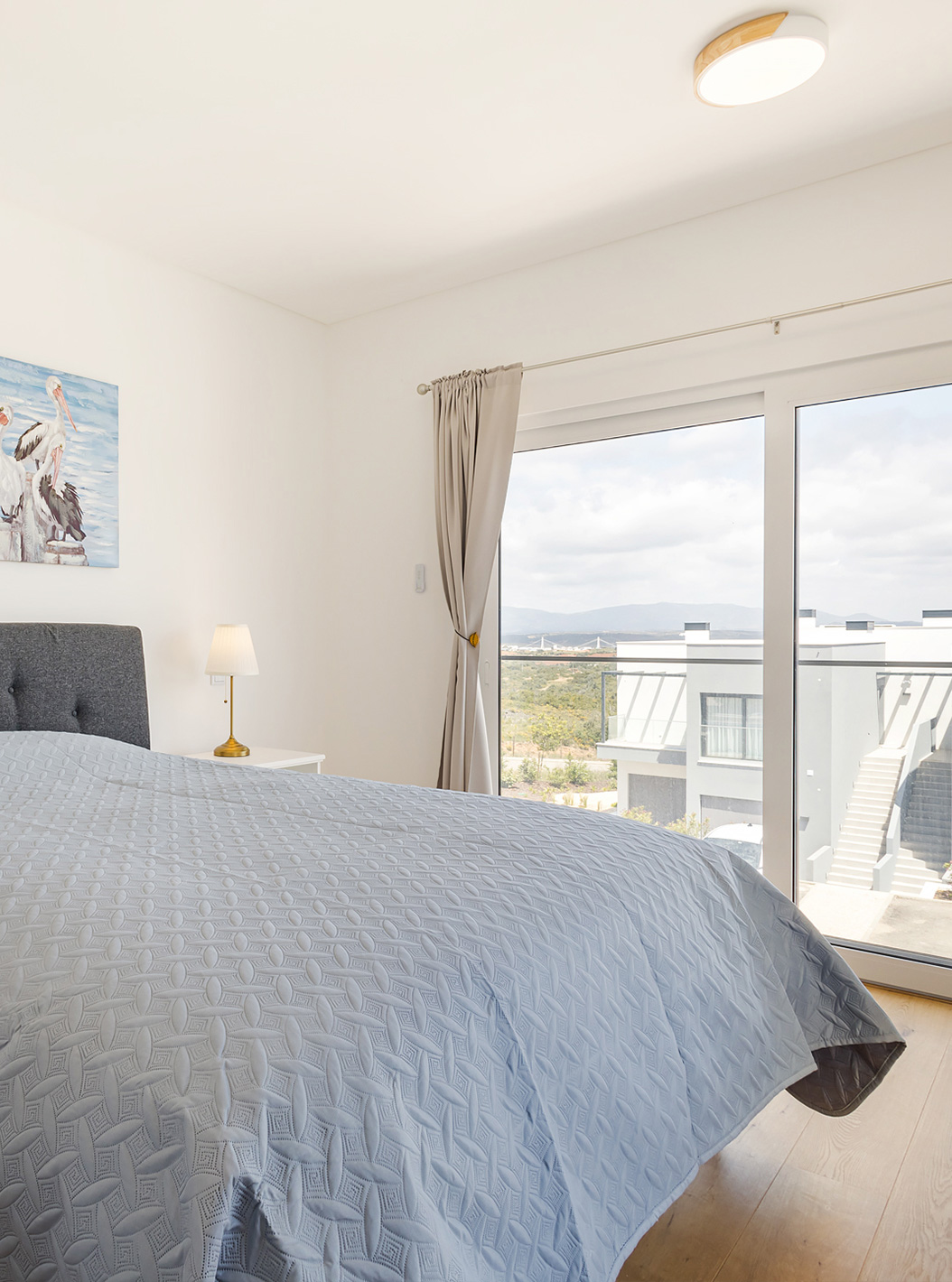 The Ground Floor 3 Bedroom Apartment - 5 Adults at Pestana Valley Nature Village has a bed and curtains in shades of grey