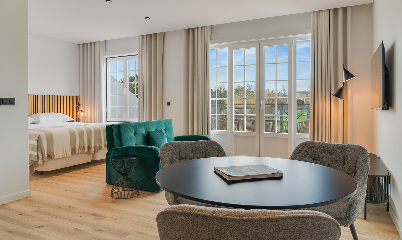 The Family with Balcony - Clubhouse of Pestana Sintra Golf has a dining table and two windows with access to the balcony