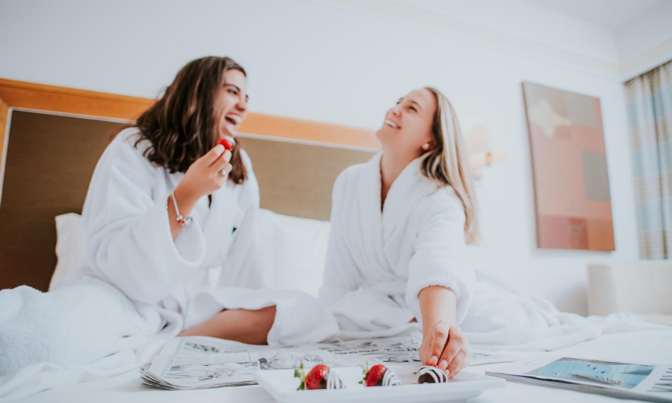 The T1 Apartment at Pestana Madeira Beach Club has bathrobes available and a bed with strawberries covered in chocolate