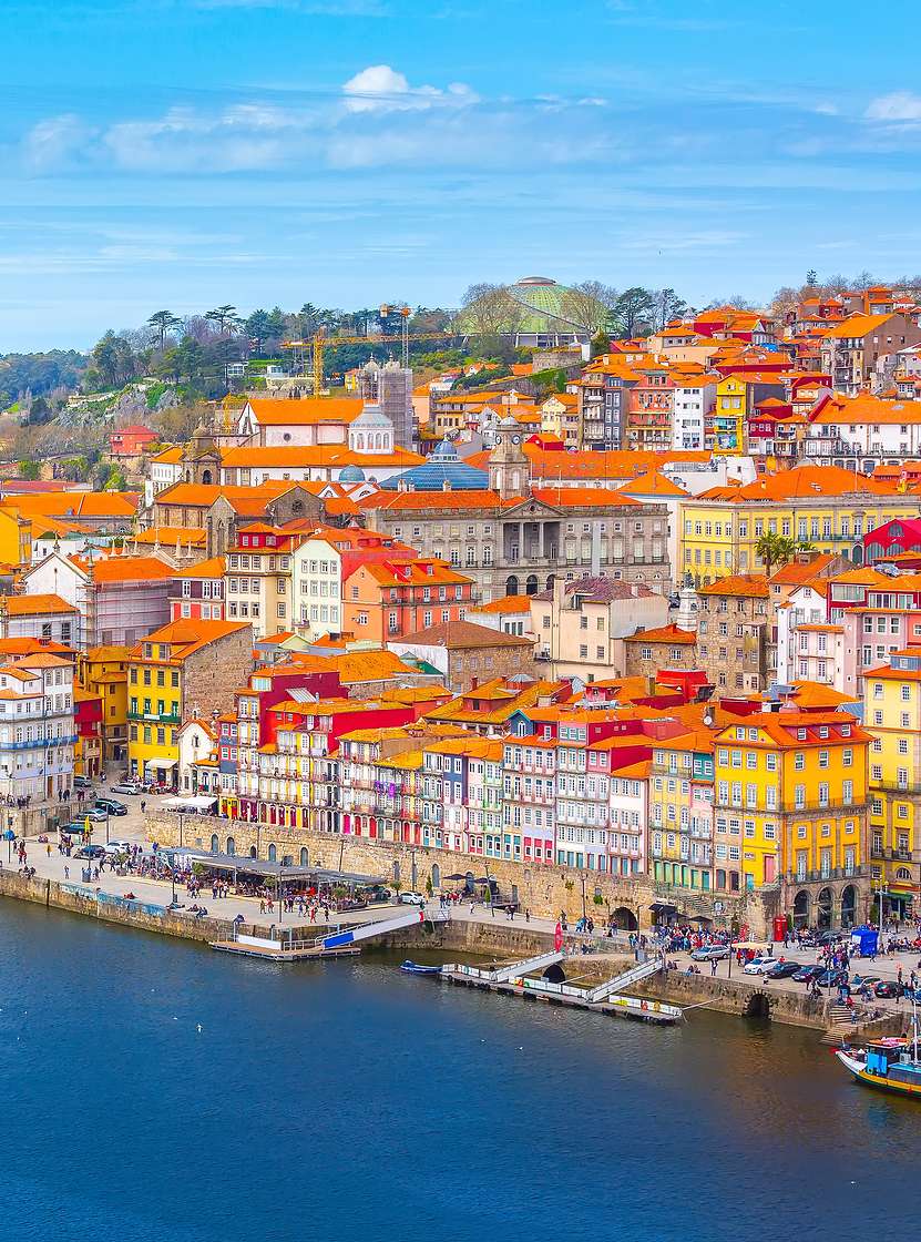 People enjoying the view of Ribeiro do Porto, a historic and tourist spot over the Douro River and the Dom Luís I Bridge