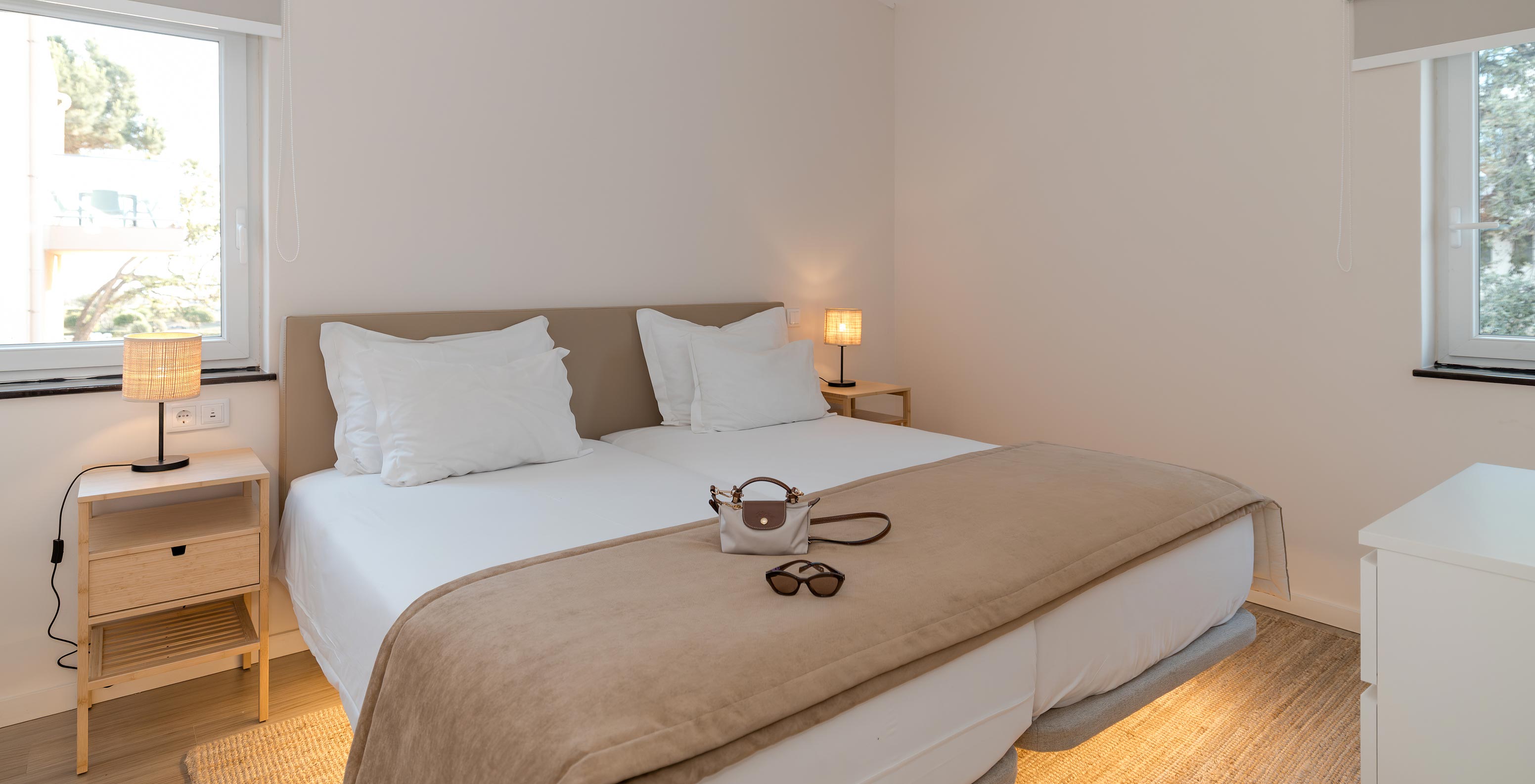 Villa 2 Habitaciones Vista Jardín en Pestana Alvor Beach Villas tiene habitación con dos camas y aire acondicionado