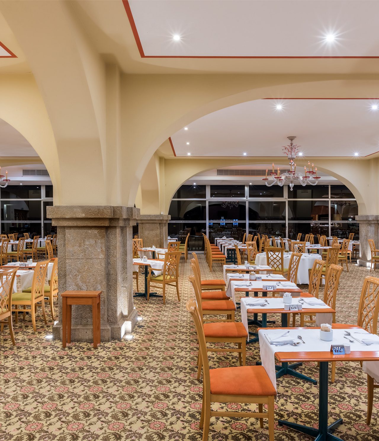 Arcos has a spacious area with chairs and tables for comfortable dining
