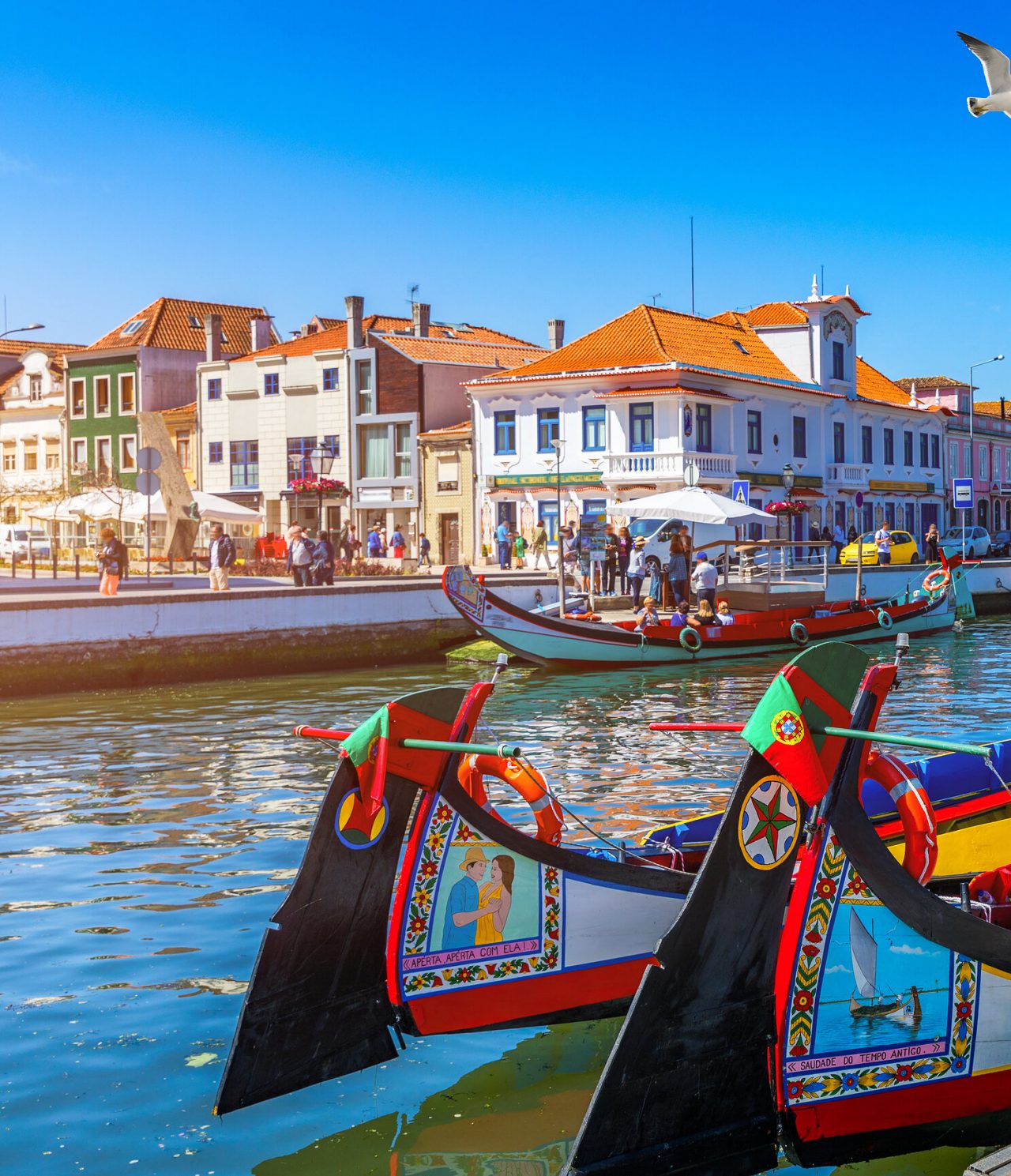 The moliceiros of Aveiro glide through the canals, while the ovos moles sweeten the local tradition